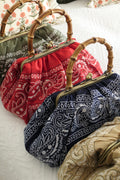 Bolso tipo Pouch Paisleys